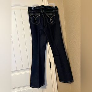 Calvin Klein flare dark blue denim jeans size 10. Never worn.  Newly  starched